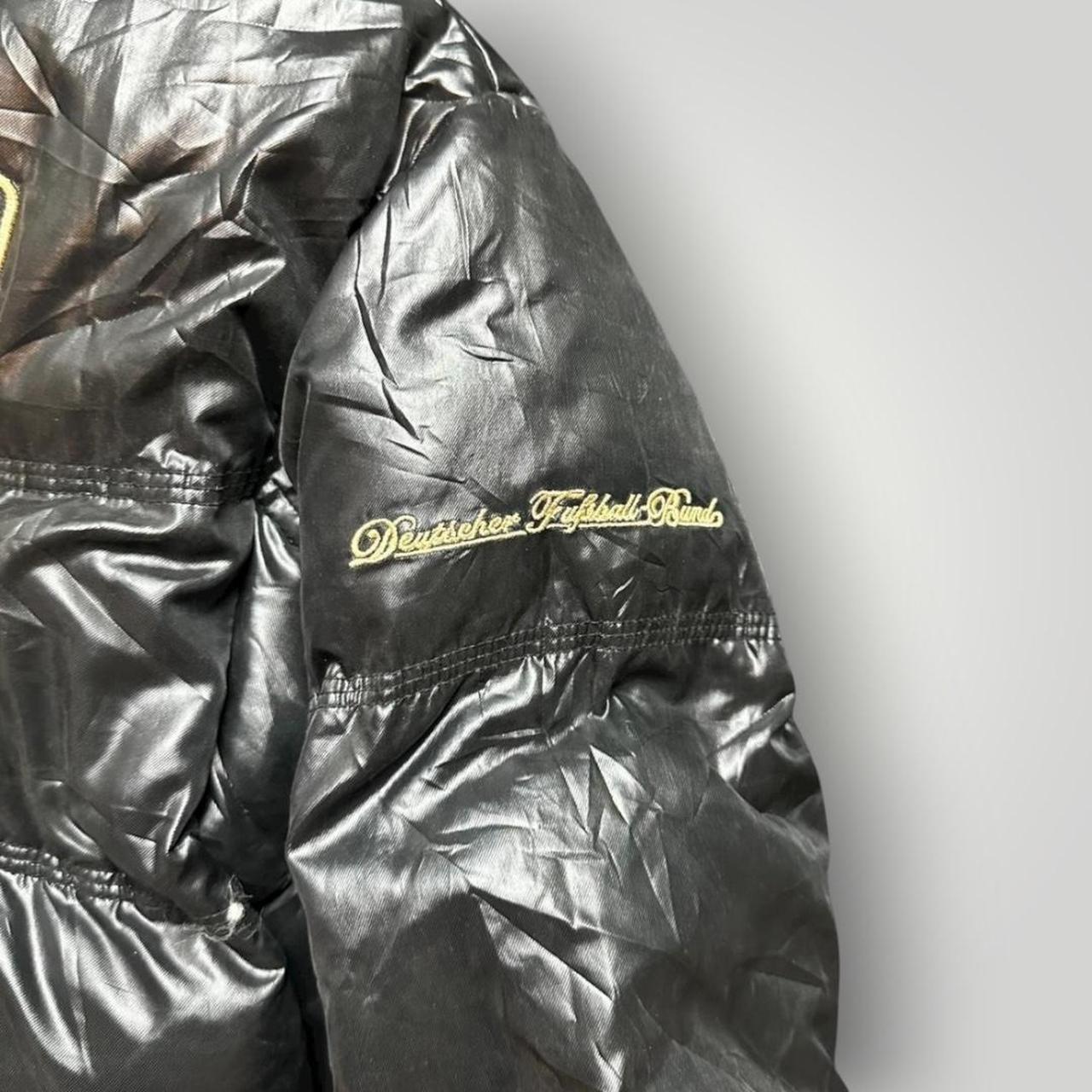 Black and gold Adidas Germany puffer jacket